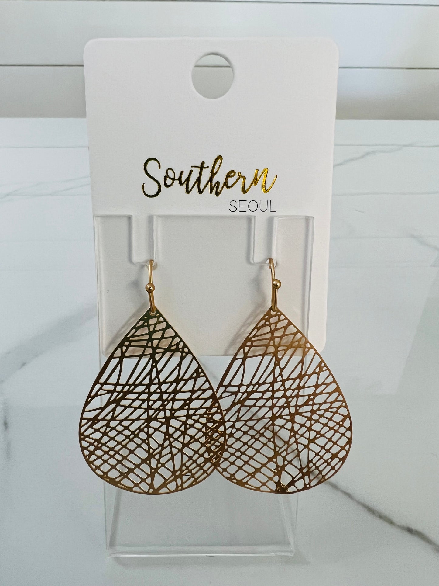 Earrings: Web