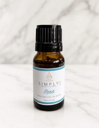 Simply 23 Reset pure essential oil blend in an amber glass bottle, 0.30 oz.