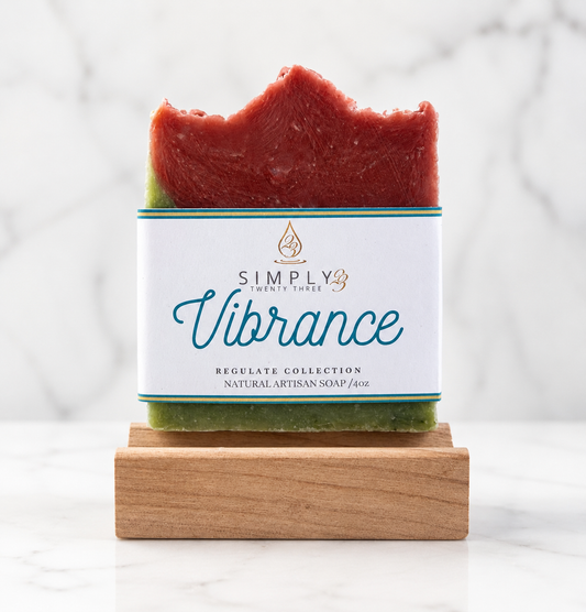 Simply 23 Vibrance natural artisan bar soap with its branded paper band.